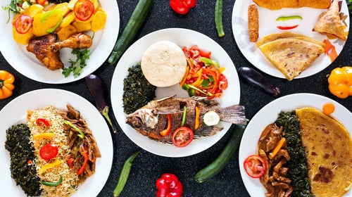 Traditional Kenyan food on plates.
