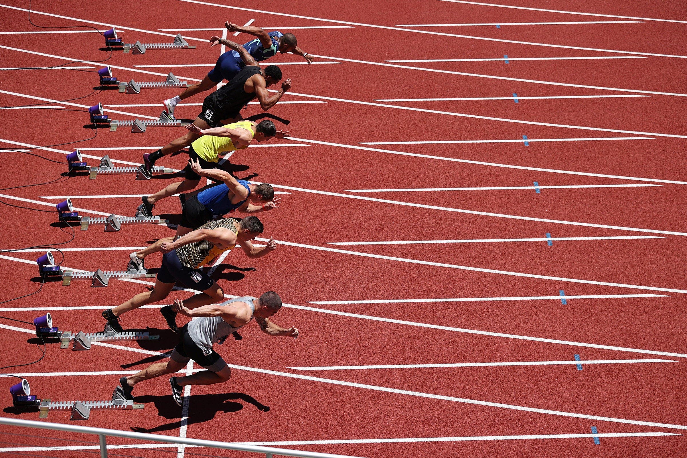 The rules say that runners can get disqualified if they put pressure on the blocks within 0.10 seconds after the gun.