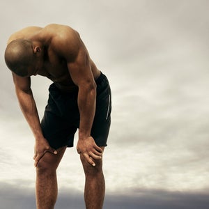 runner with hands on knees