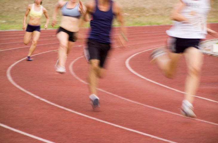 group doing track intervals