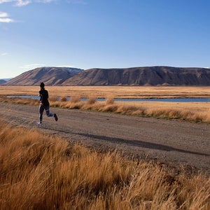 Woman running 20 miles on paved road.