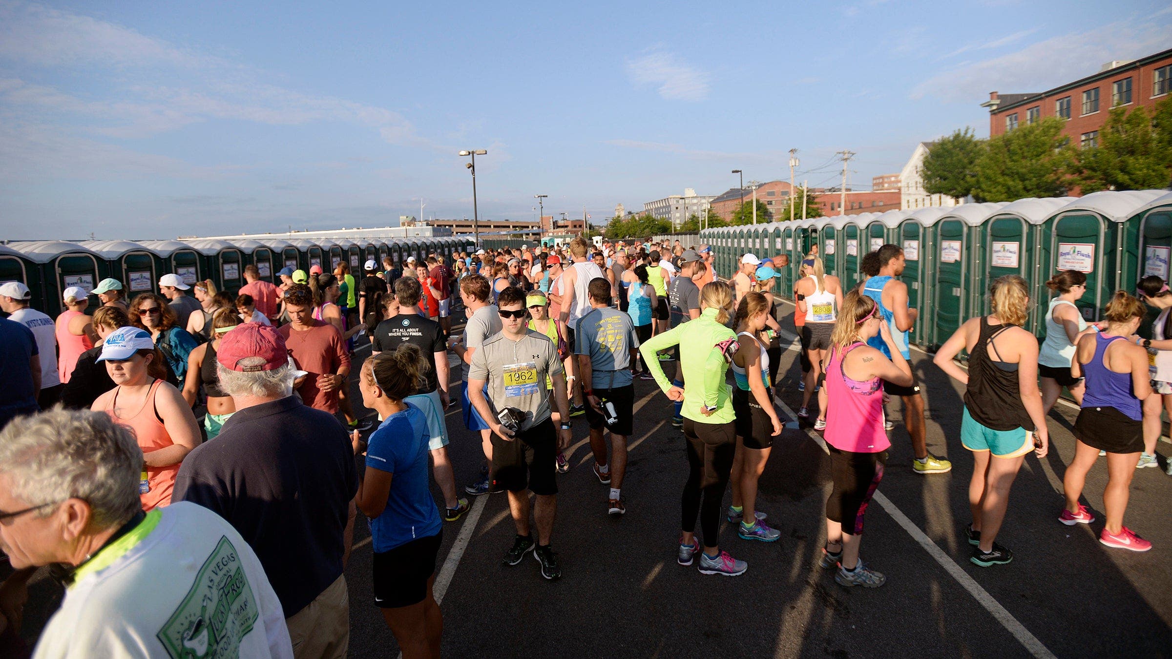 runners waiting for porte-johns