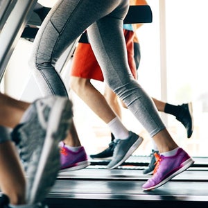 Picture of people running on treadmill in gym.