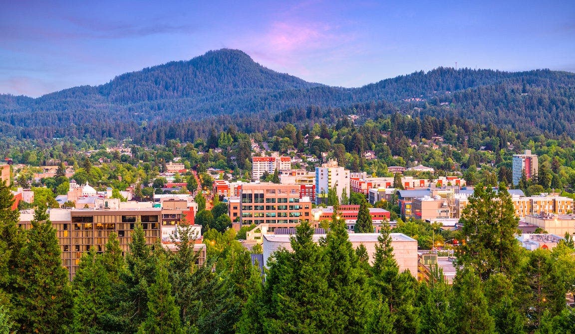 Eugene, Oregon, USA downtown cityscape at dusk.