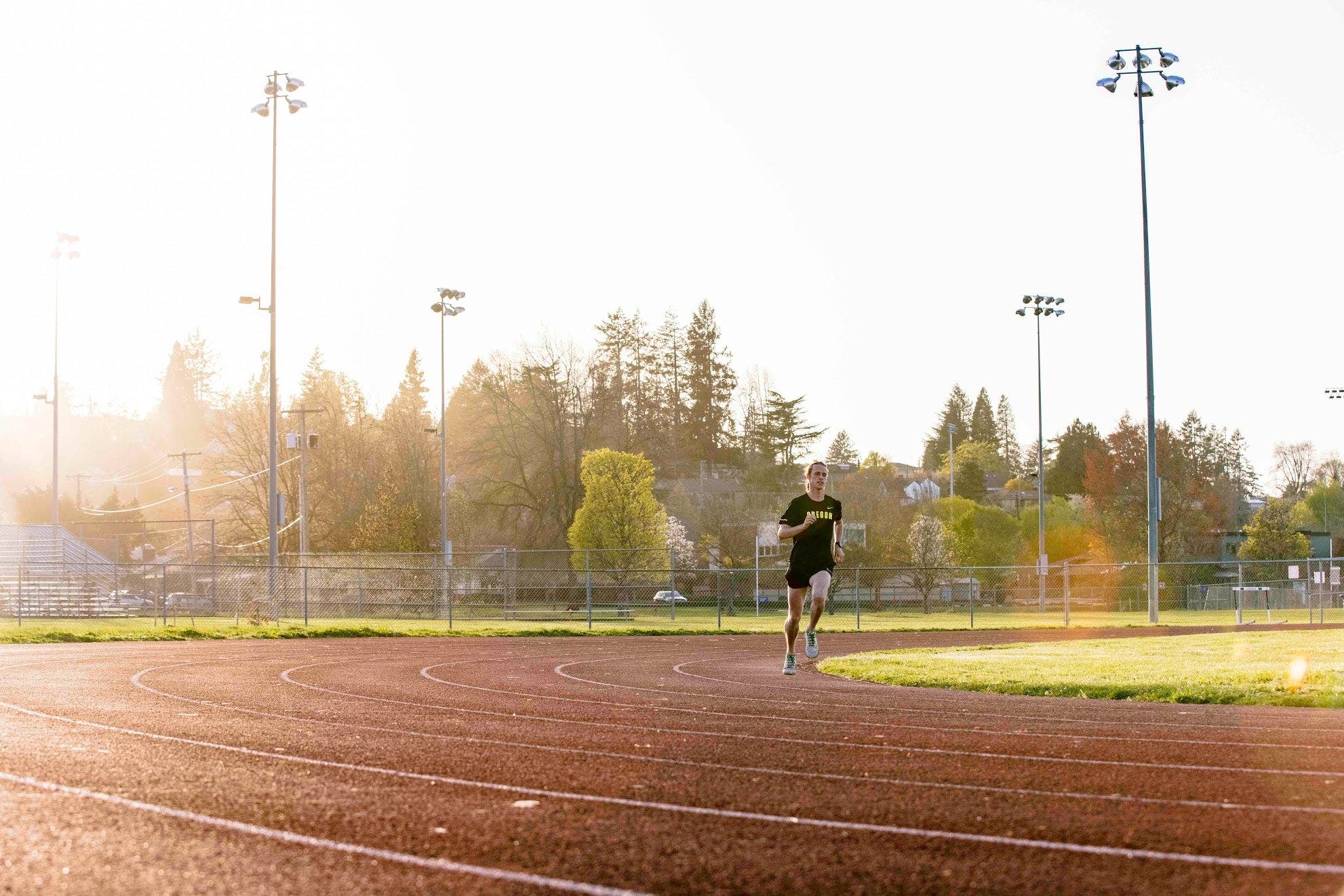 Cole Hocker running on a track