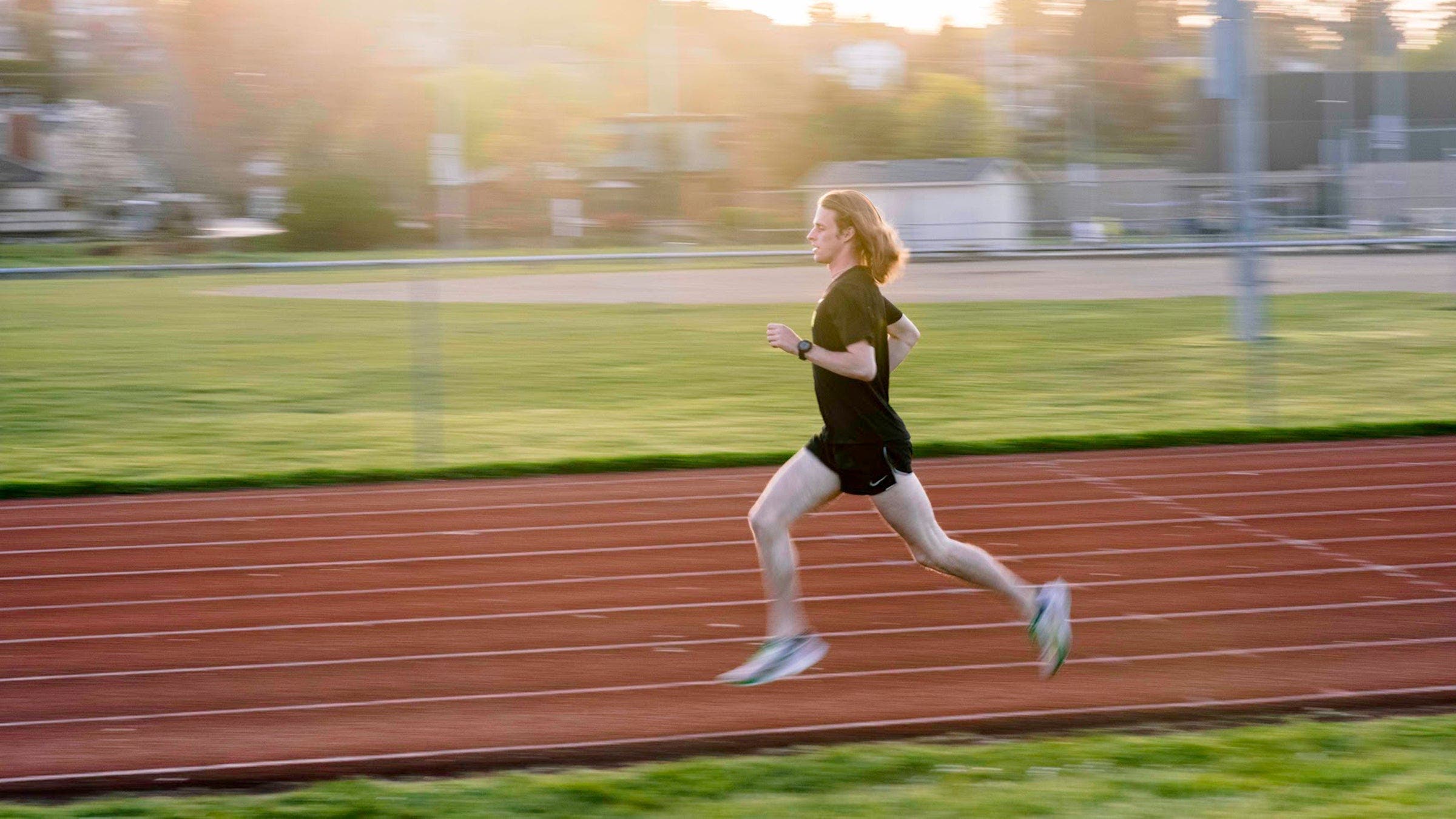 Cole Hocker running on a track