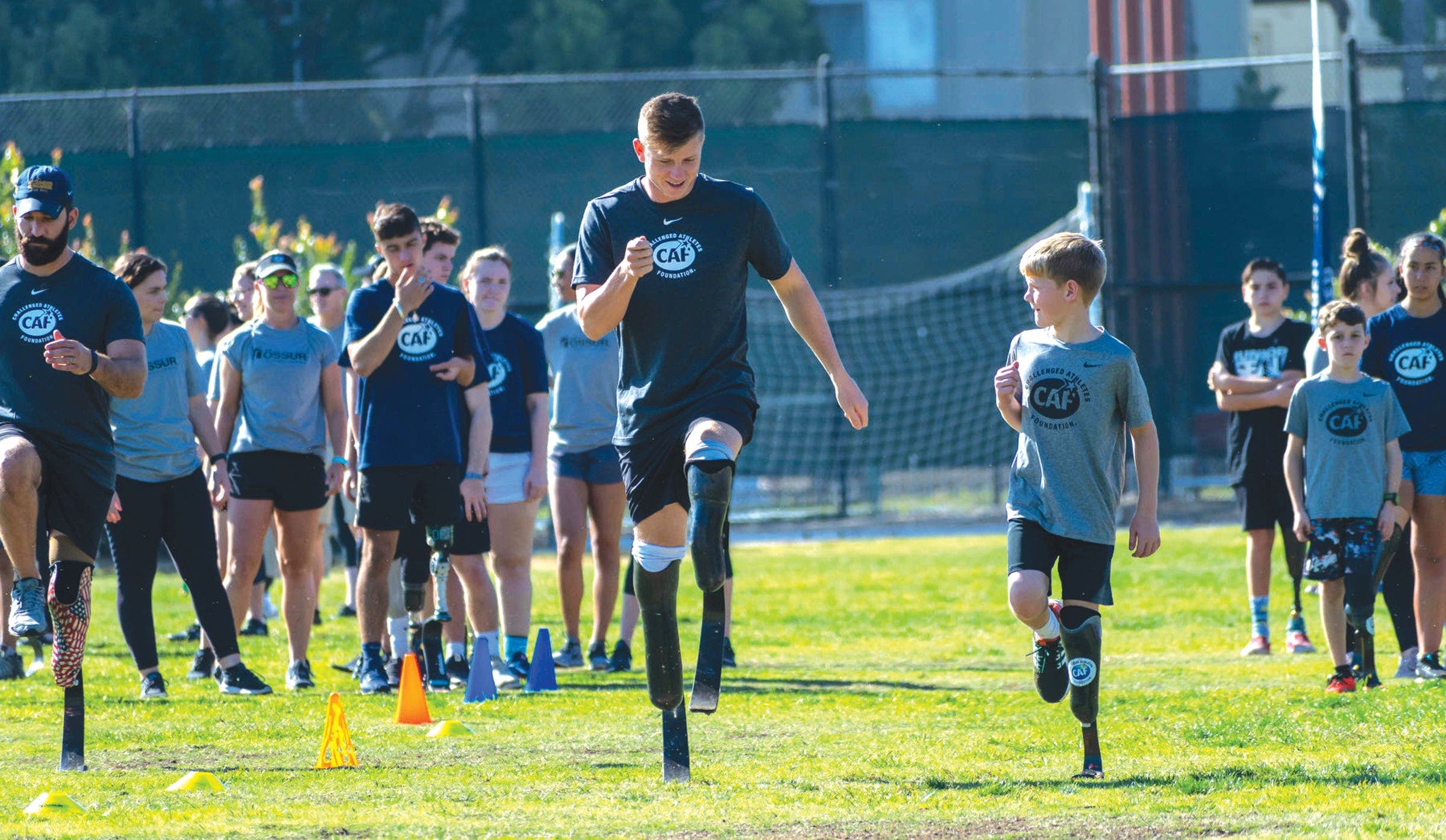 Hunder Woodhall with fans at a CAF clinic