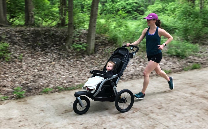 Tina Muir pushing daughter in running stroller