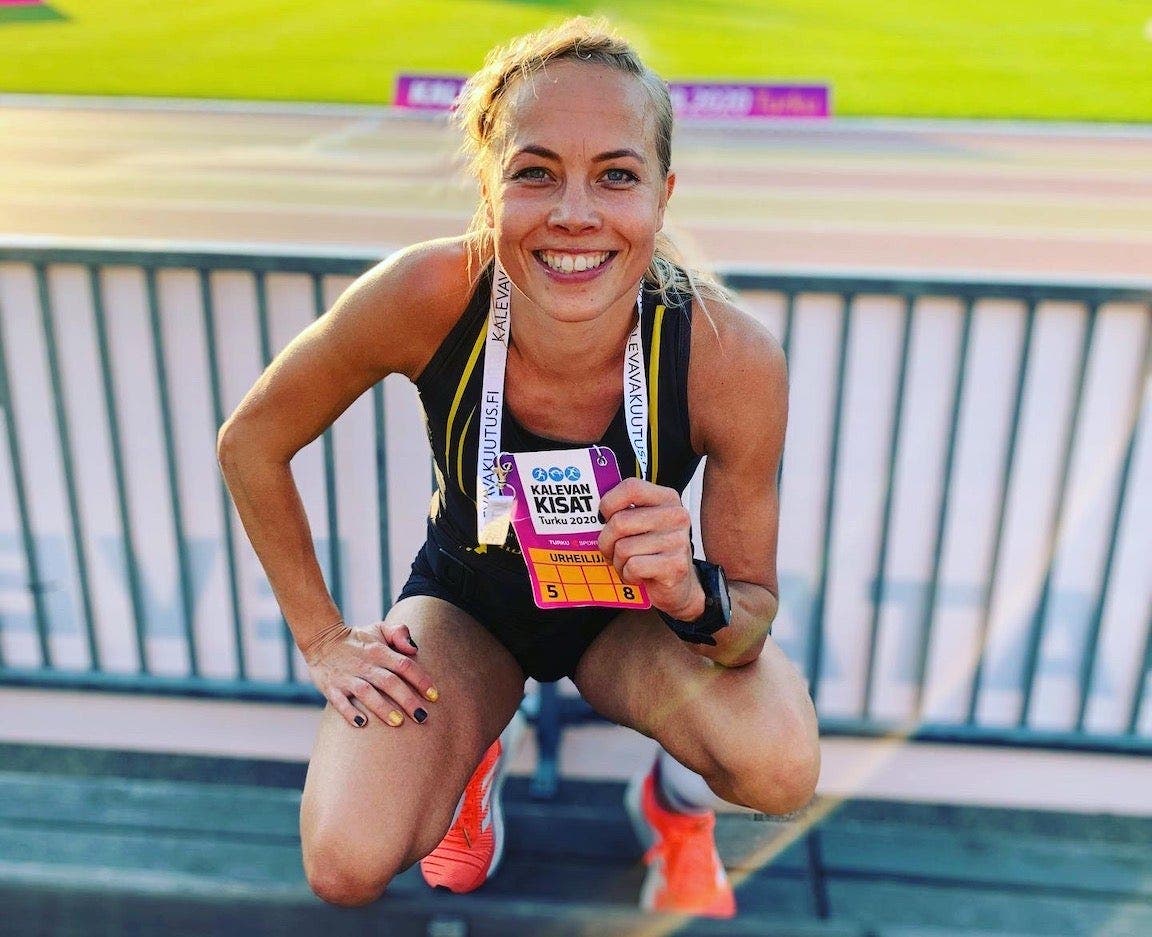 Johanna Sällinen posing after a race.