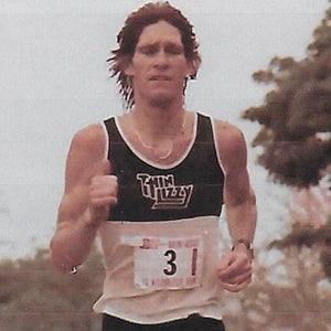 Old photo of Jon Sutherland running.