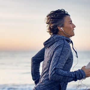 Woman jogging at beach