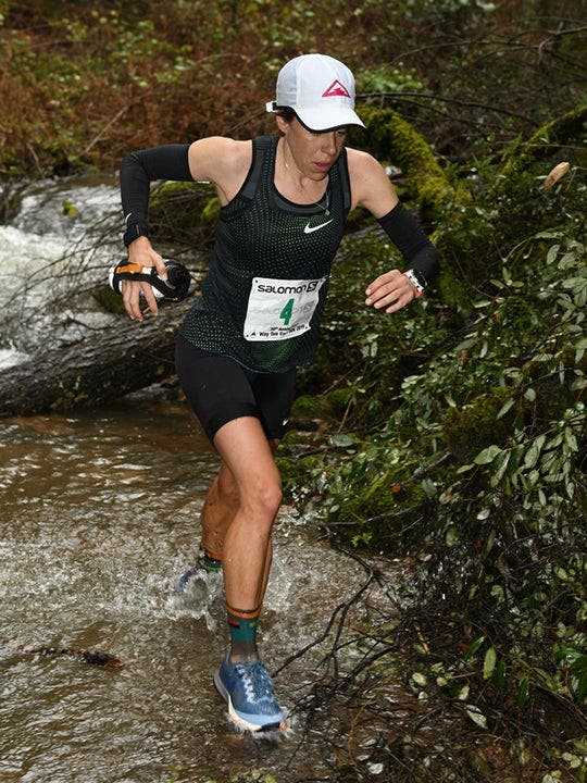 Addie Bracy with Nathan handheld water carrier