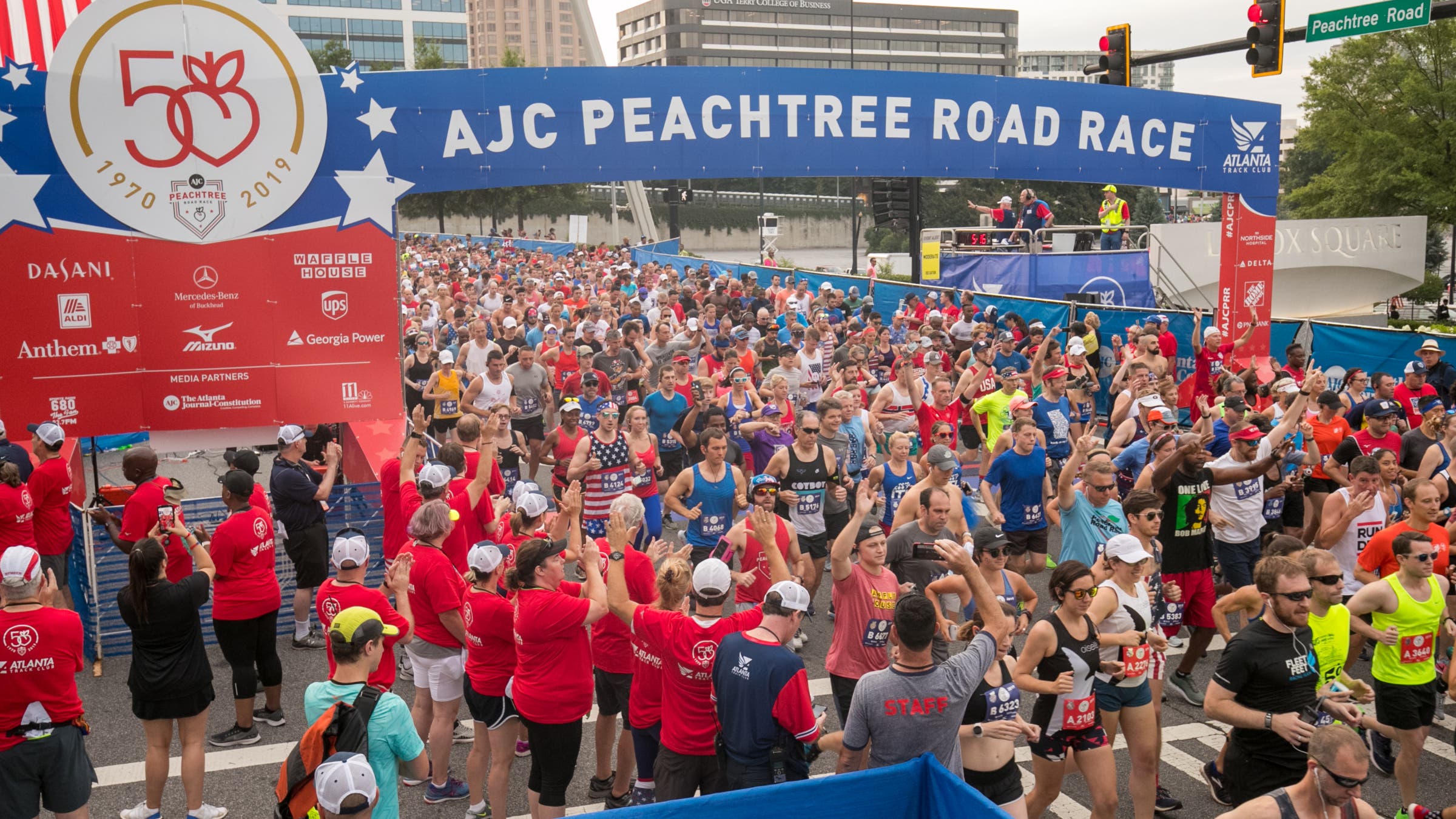 The 50th running of the AJC Peachtree Road Race at the starting line at Lenox Square.
