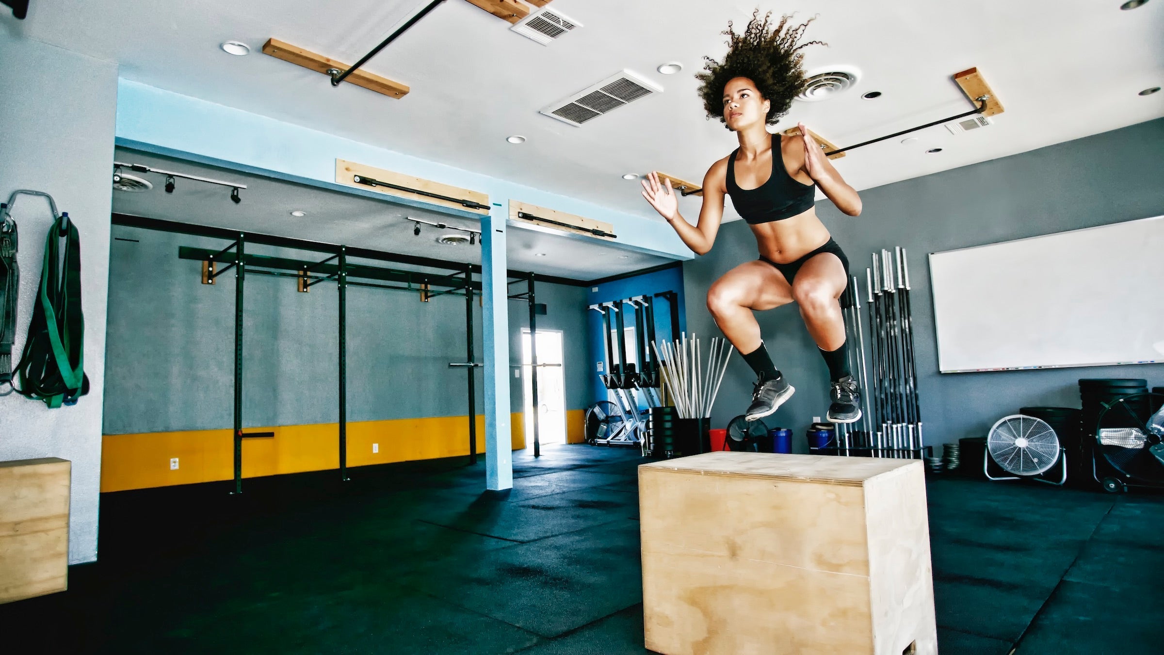 Woman doing box jumps
