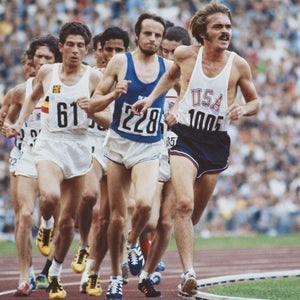 Steve Prefontaine #1005 of the United States leads Lasse Viren of Finland #228 and Emiel Puttemans of Belgium #61 during the Men's 5,000 metres event at the XX Summer Olympic Games on 10 September 1972 at the Olympic Stadium in Munich, Germany.