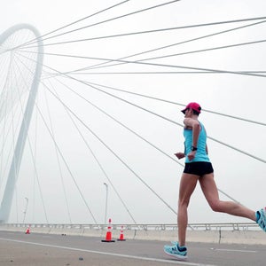 Participants run across the Margaret Hunt Hill Bridge during the Toyota Rock 'N' Roll Dallas Half Marathon