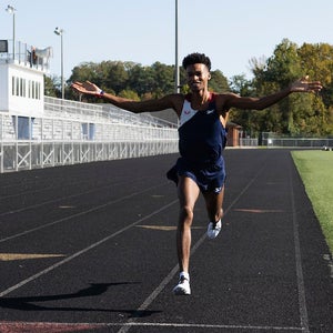 Justyn Knight finishing a workout on the track in Boston