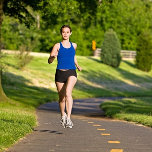 Woman running in a park