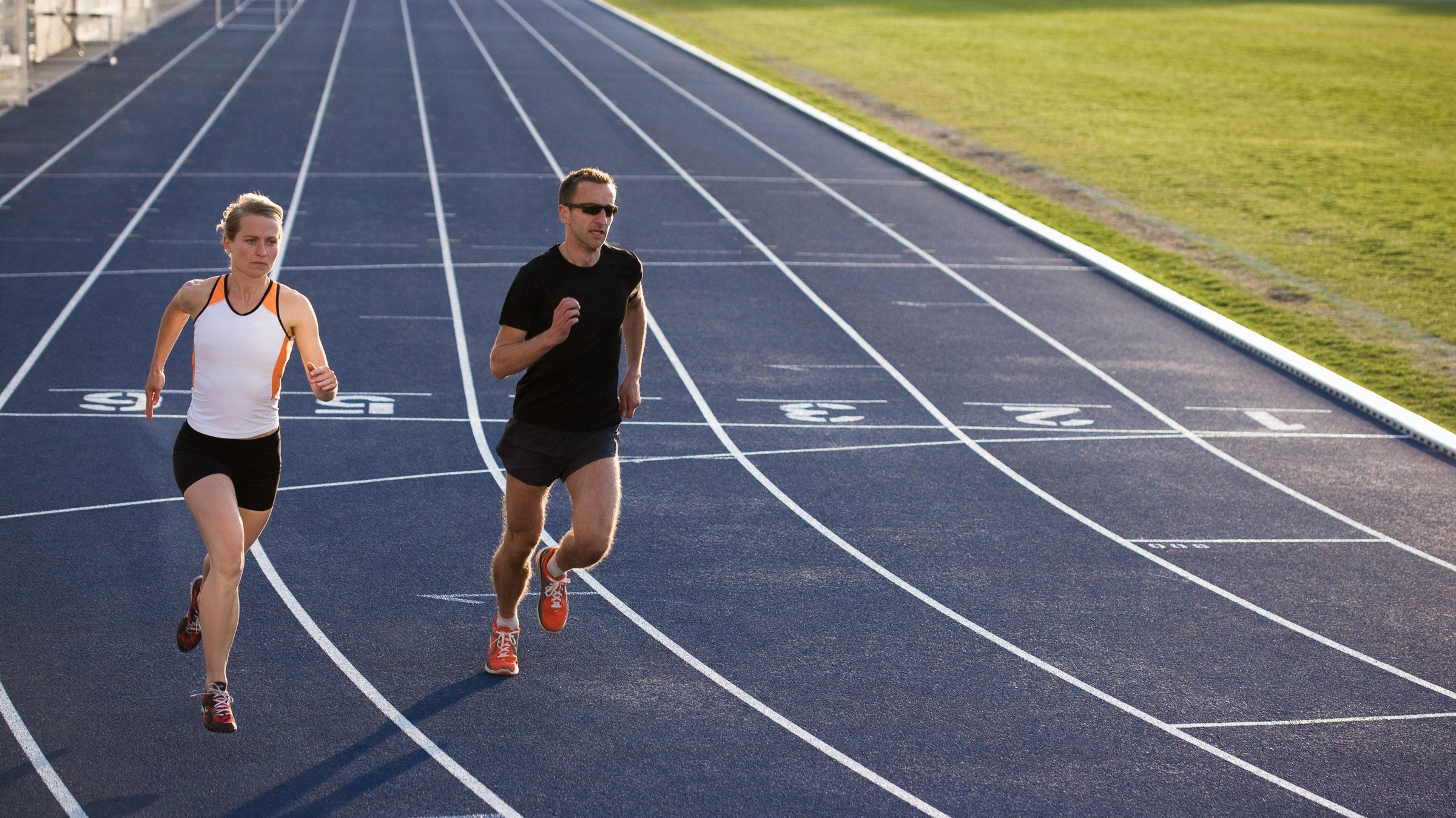 Two runners on a track