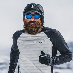 Ultrarunner Tommy Rivs runs in the mountains