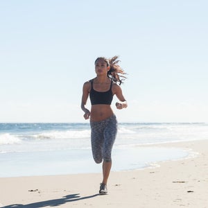 Woman running on beach