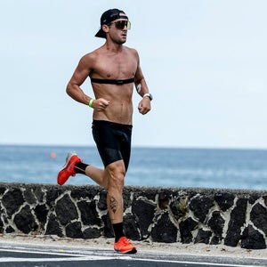 Man running with wearable sweat patch on.