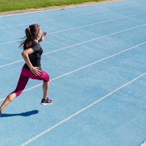 woman sprint workout on track