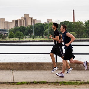 two men running together