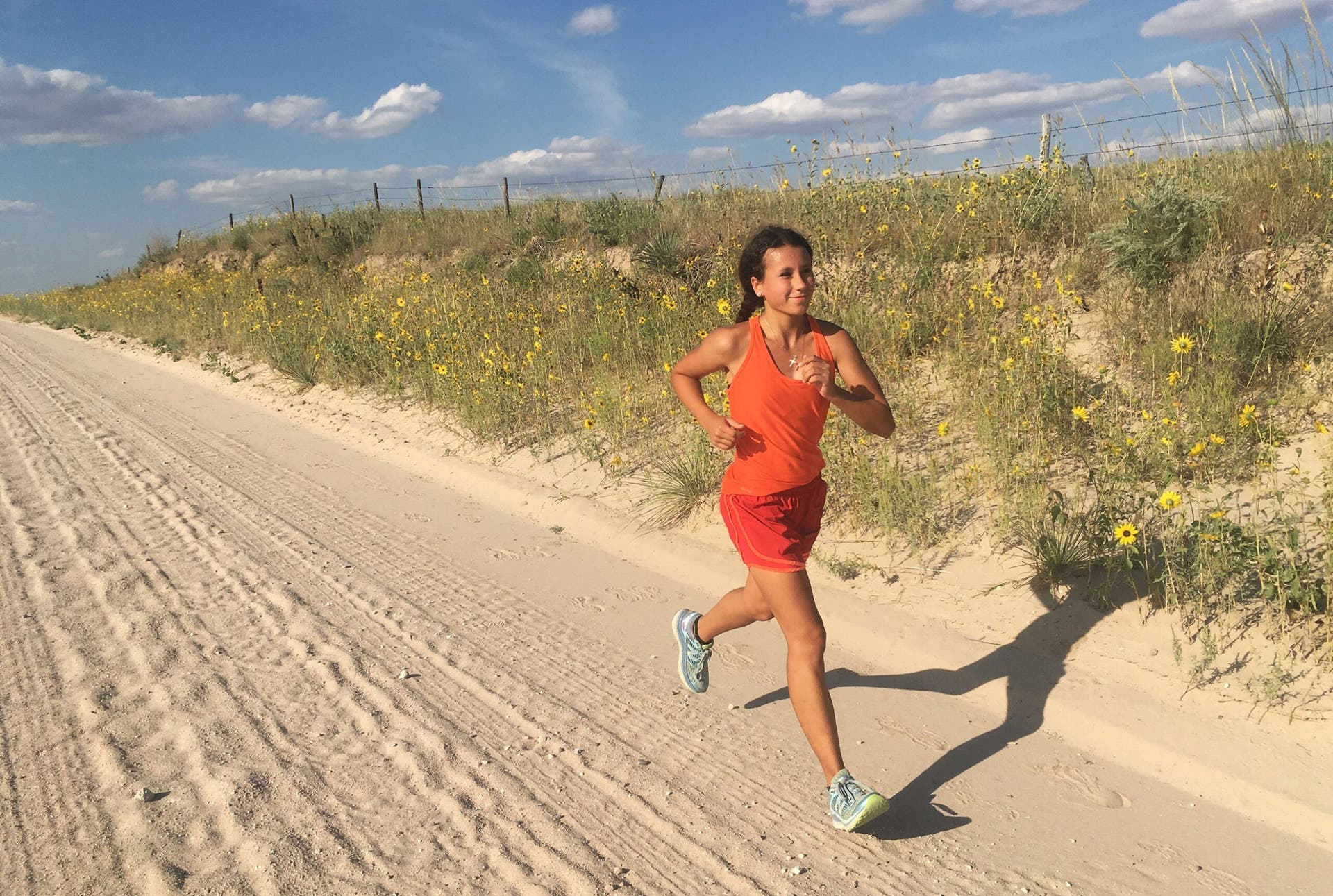 woman running strong long run