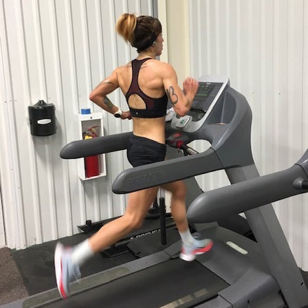 Maddie Van Beek training on the treadmill