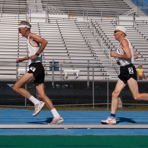 Masters Male Runners on Track