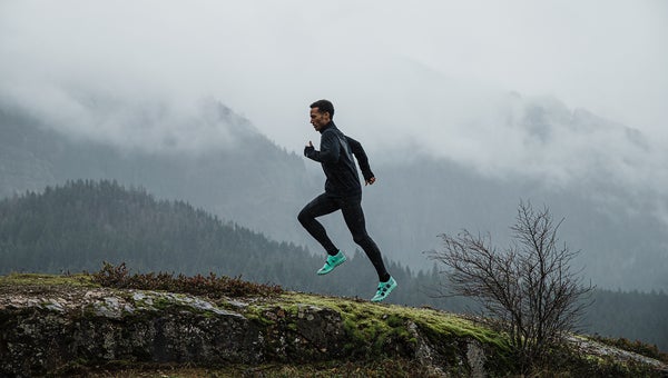 A runner wearing the Speedland SL:PDX shoes