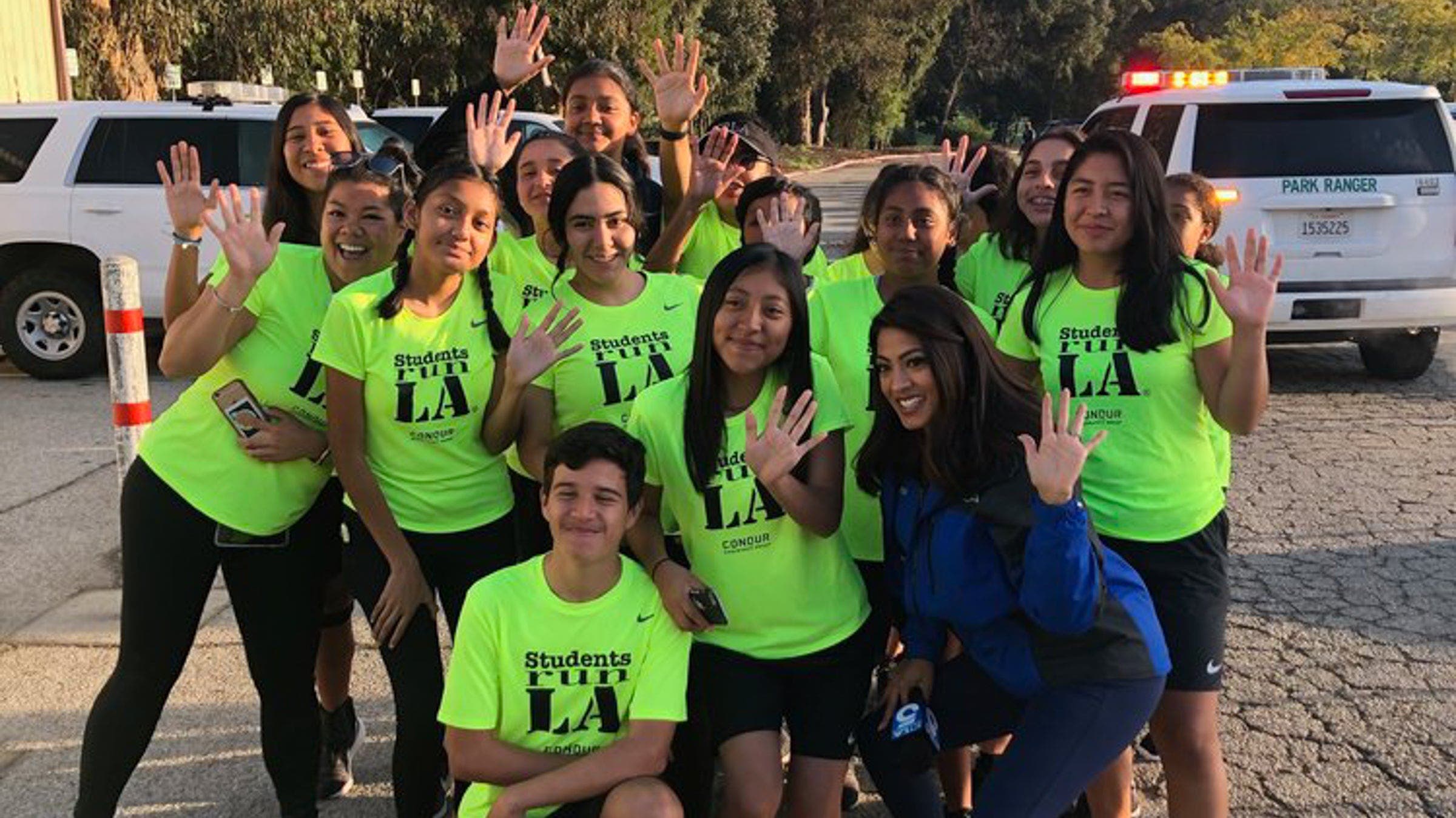 Group shot of students in SRLA shirts posing for a group shot