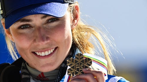 Mikaela Shiffrin celebrates on the podium during the medal ceremony after competing in the first and second run of the Women's Slalom on February 20, 2021 at the FIS Alpine World Ski Championships