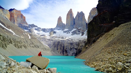 Torres del Paine, Chile: gorgeous snowy peaks over a bright blue body of water