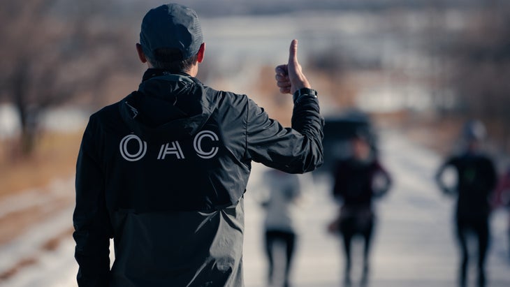 Dathan Ritzenhein gives the OAC athletes a thumbs up as they do a workout in Boulder, Colorado.