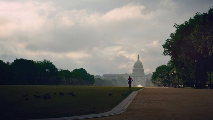 Runner running on the U.S. National Mall in the summer.