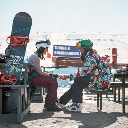 snowboarders Jade Abbott (left) and Chris Fourie share a moment