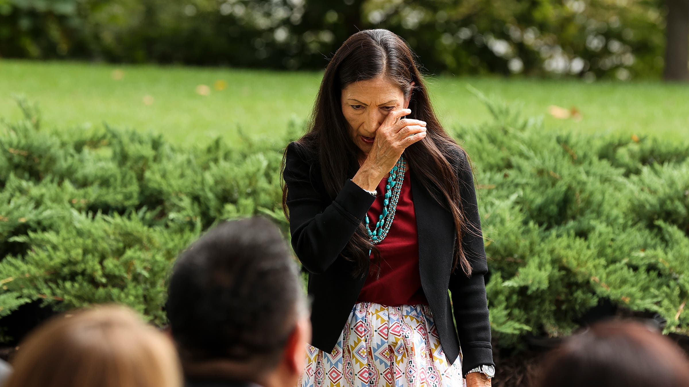 Haaland at the White House, listening to President Biden outline an expansion of three national monuments