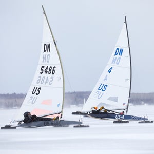 Iceboat racers round the turn near the windward mark at the 2021 IDNYIRA Nationals.