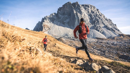 Trail runners in the alps
