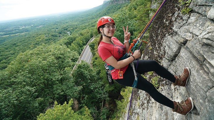 Girl climbing rocks