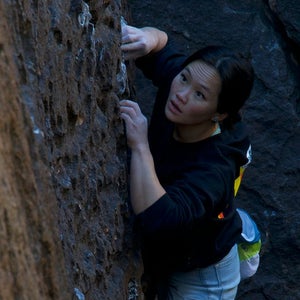 Woman rock climbing