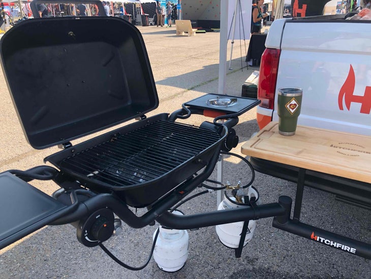 Grill attached to back of pickup truck