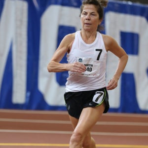 Kathryn Martin competing on an indoor track