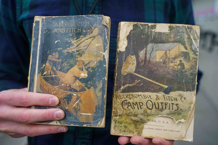 Hands holding old books
