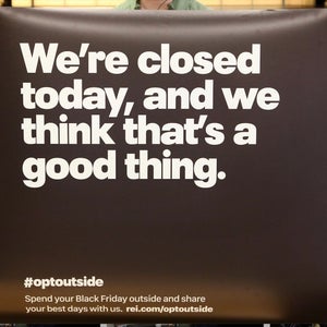 REI OptOutside campaign poster