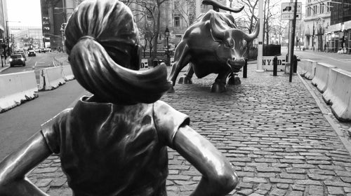 Fearless Girl and Bull statues on Wall Street