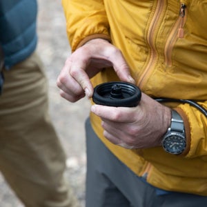 Closeup of a person holding a piece of equipment