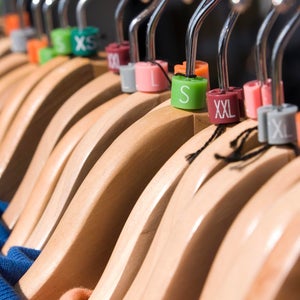 Clothing hangars with sizing tags
